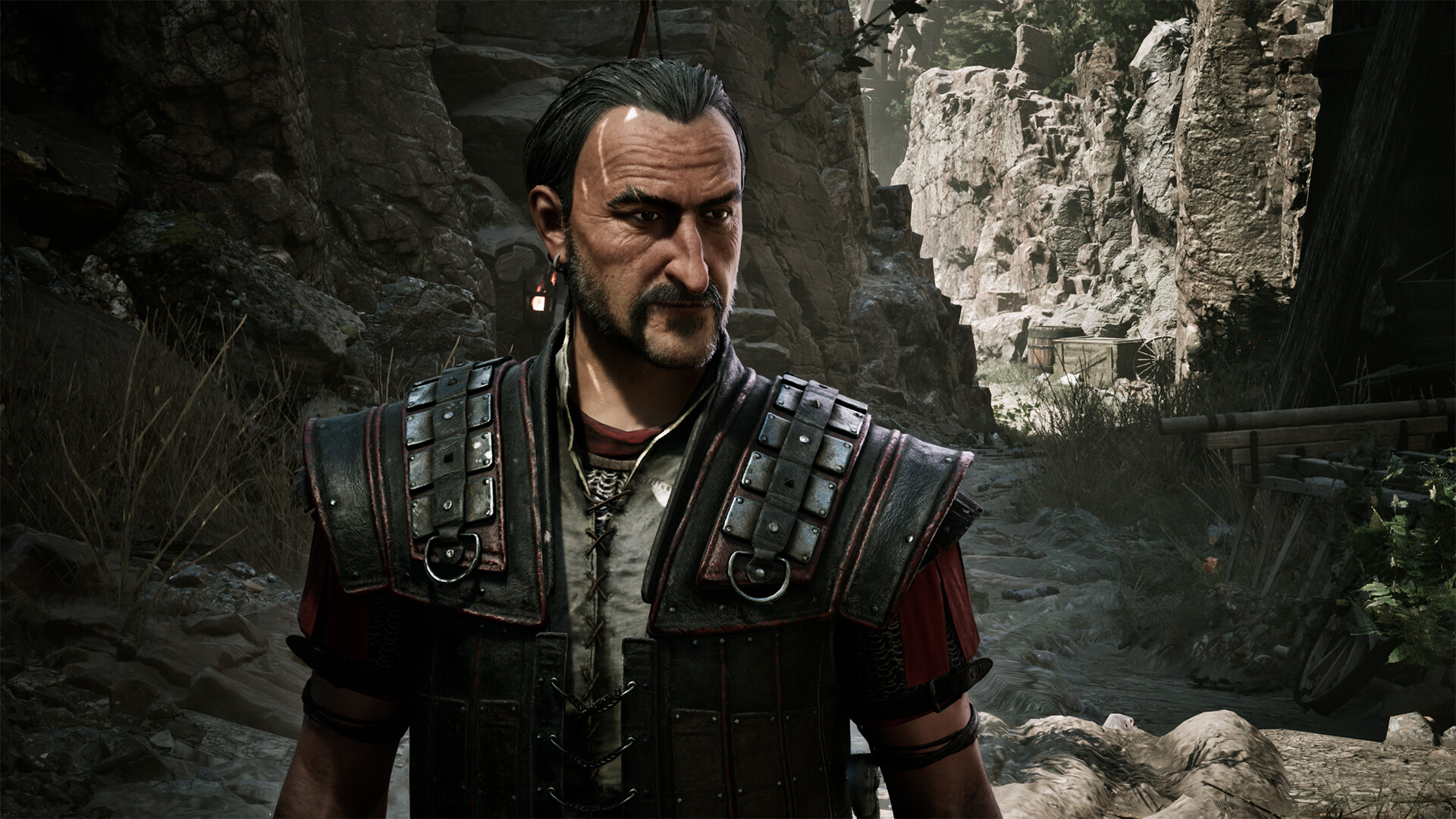 Gothic 1 Remake builds — a scarred fighter in studded leather pauldrons stands in a rocky canyon