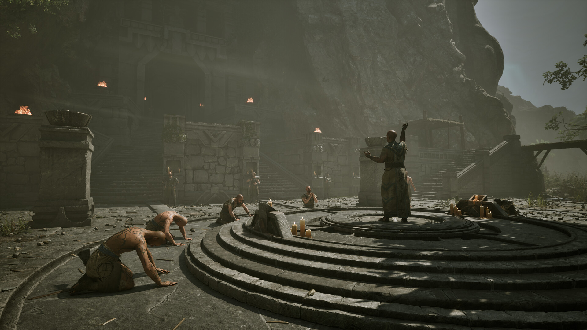 Gothic 1 Remake camp — robed worshippers kneel around a torch-lit ritual circle in the Swamp Camp